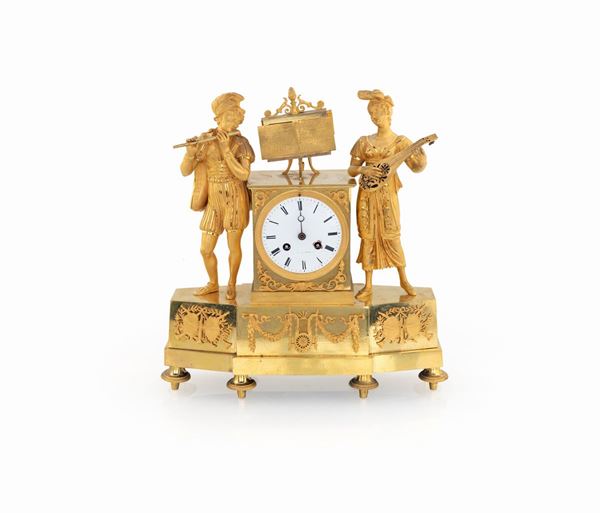 Orologio in bronzo dorato, XIX secolo  - Asta Mobili, Arredi, Dipinti Antichi e del XIX Secolo - Casa d'Aste Arcadia