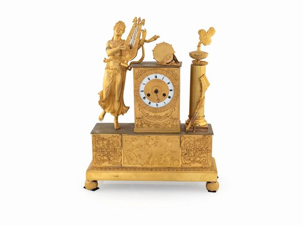 Orologio in bronzo dorato, XIX secolo  - Asta Mobili, Arredi, Dipinti Antichi e del XIX Secolo - Casa d'Aste Arcadia