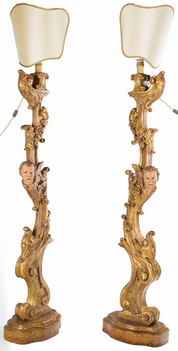 Coppia di torciere in legno intagliato e dorato, XVIII/XIX secolo