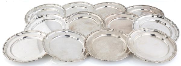 Dodici piatti in argento 800/1000