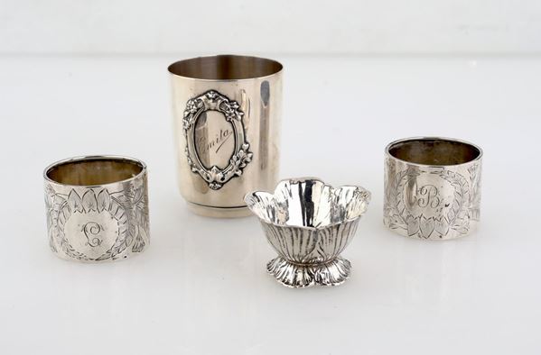 Lotto composto da quattro complementi da tavola in argento