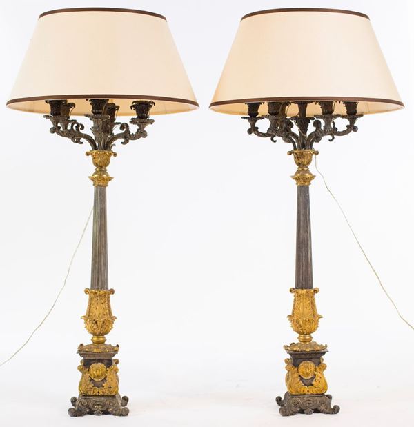 Coppia di grandi candelabri in bronzo argentato e dorato a sette luci, primo quarto del XIX secolo