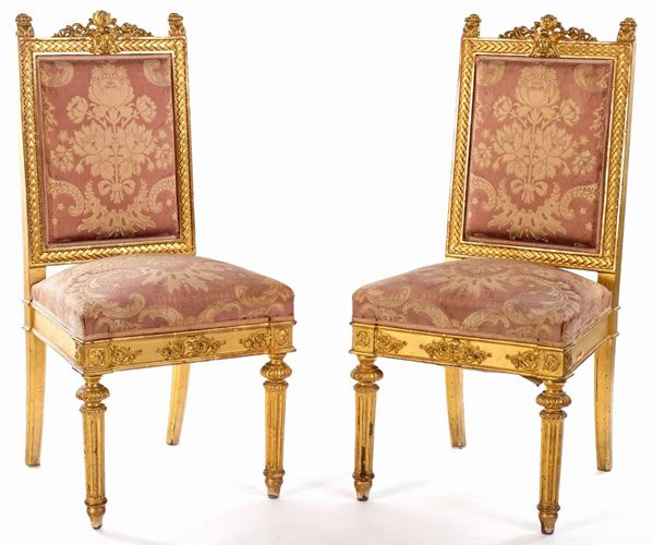 Coppia di sedie in legno dorato, prima met&#224; del XIX secolo