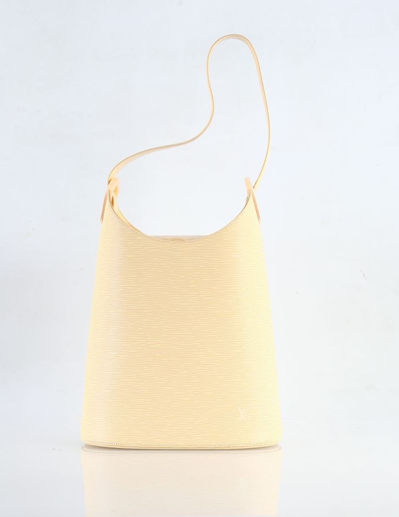 Luis Vuitton, Verseau