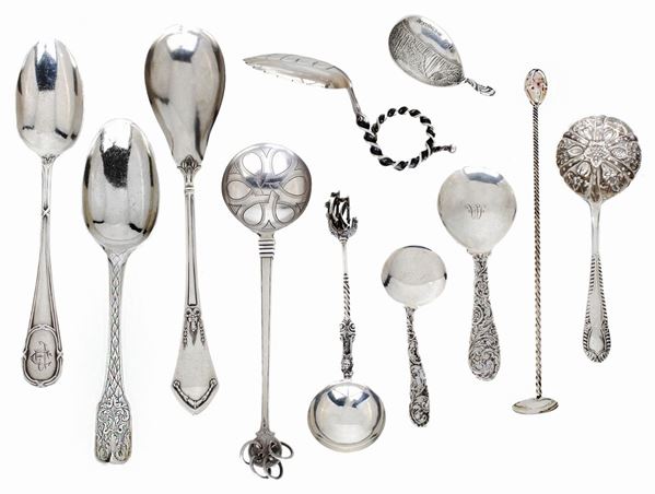 Nove cucchiai da collezione in argento a diverso titolo e due in metallo argentato