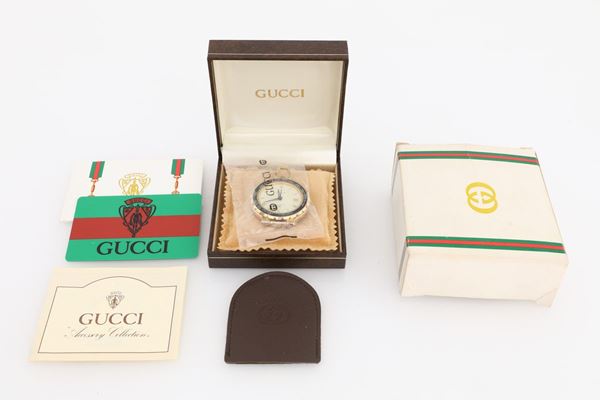 Gucci, sveglia da tavolo al quarzo GMT in metallo dorato e laccato