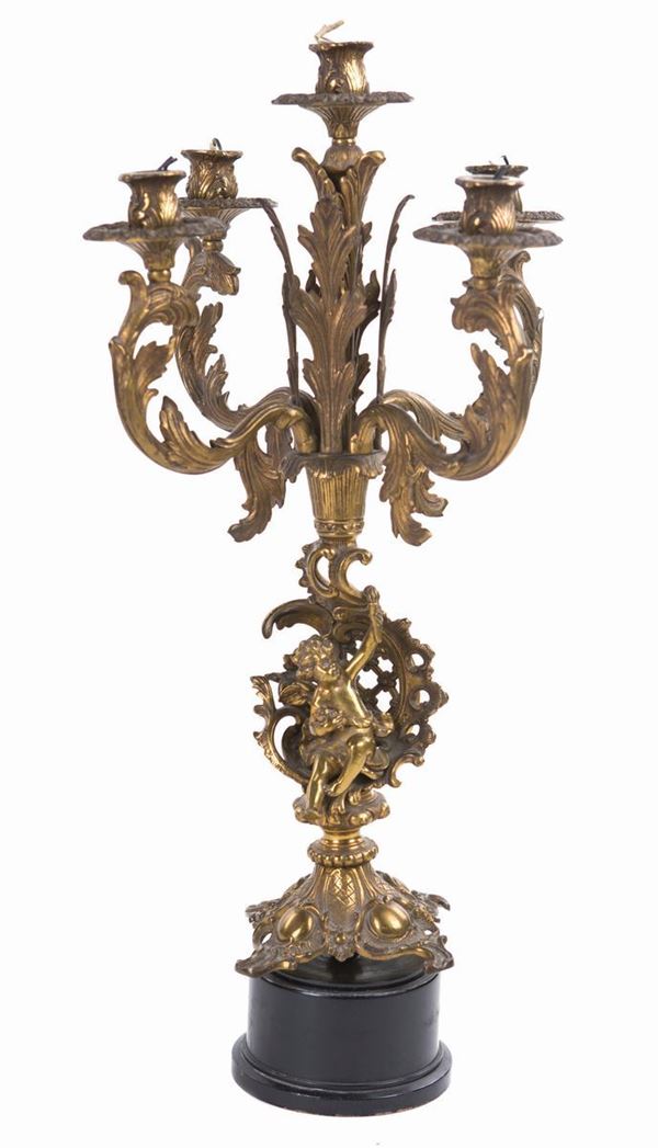 Candelabro in bronzo dorato