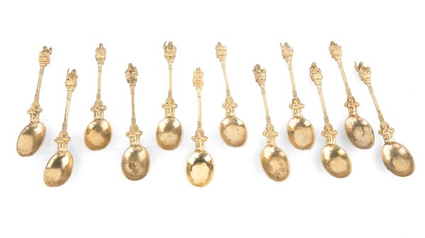 Dodici antichi cucchiai degli apostoli in ottone dorato