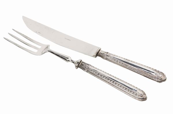 Due posate da arrosto in argento e acciaio