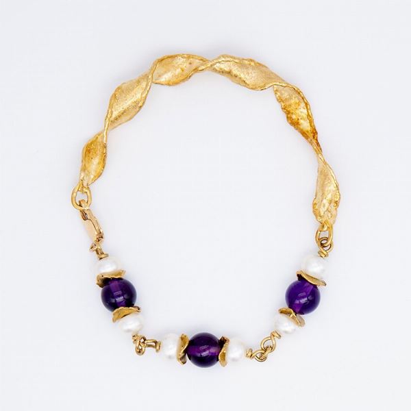 Bracciale semirigido con perle freshwater e ametiste a sfera