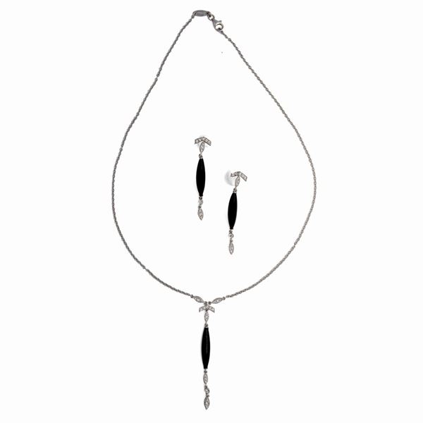 Parure in oro collana e orecchini, brillanti e onice