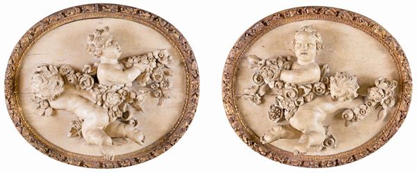 Coppia di altorilievi ovali in legno scolpito, Francia, XVIII secolo