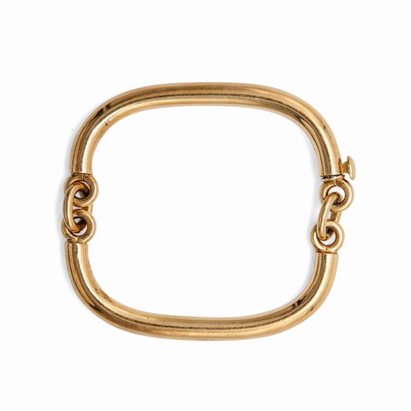 Bracciale rigido in oro giallo a manetta
