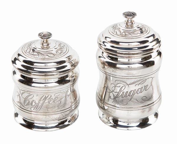 Due contenitori in argento 800 con coperchio