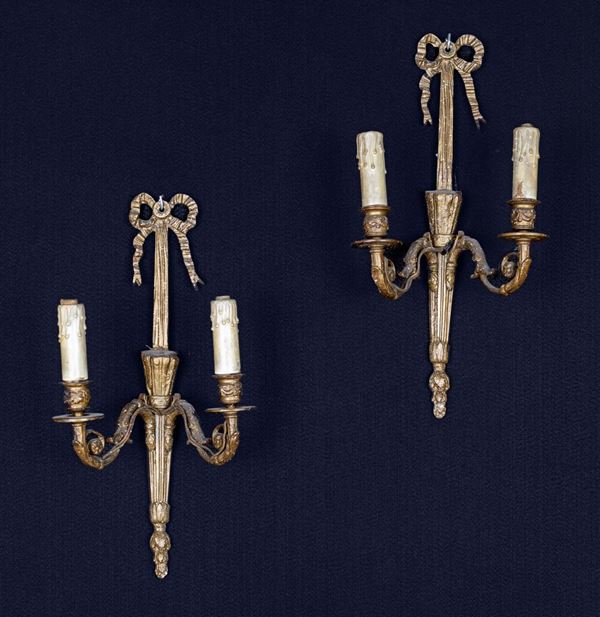 Coppia di applique in ottone a due luci