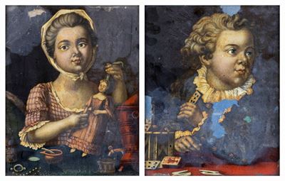 A) Bimba con la Bambola B) Bambino con le Carte