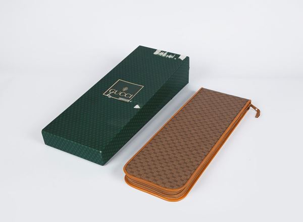 Gucci - Portacravatte da viaggio in tessuto Gucci Supreme, con finiture in pelle