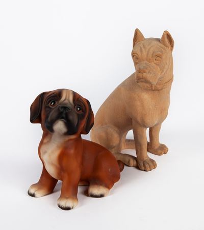 Due Figure di Cane Boxer Diverse