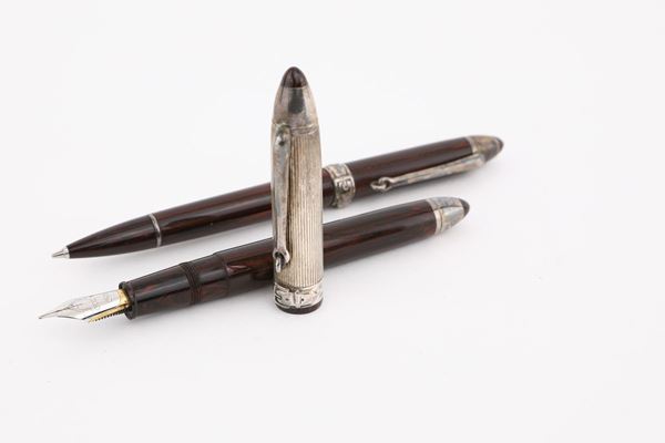 Gucci. Penna stilografica Florentia 6 CCLXXXIV e Portamine α XXXII in argento 925% ed ebanite