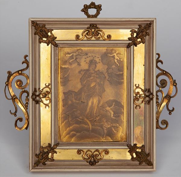 Antica placca in metallo dorato con incisione