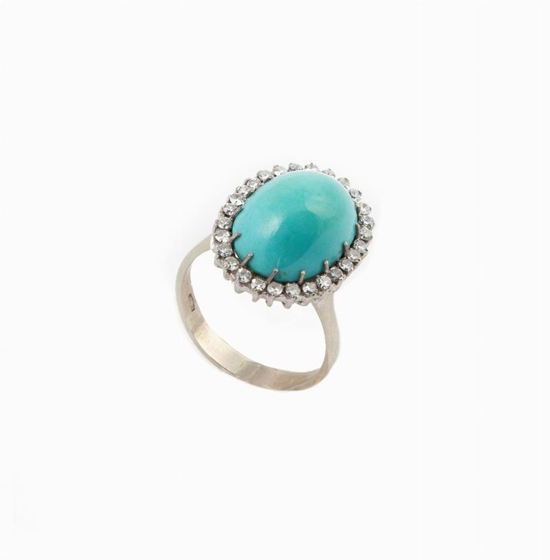 Anello in Oro Bianco e Spola di Turchese