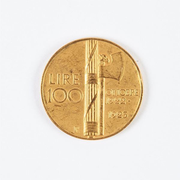 Moneta 100 lire d'oro