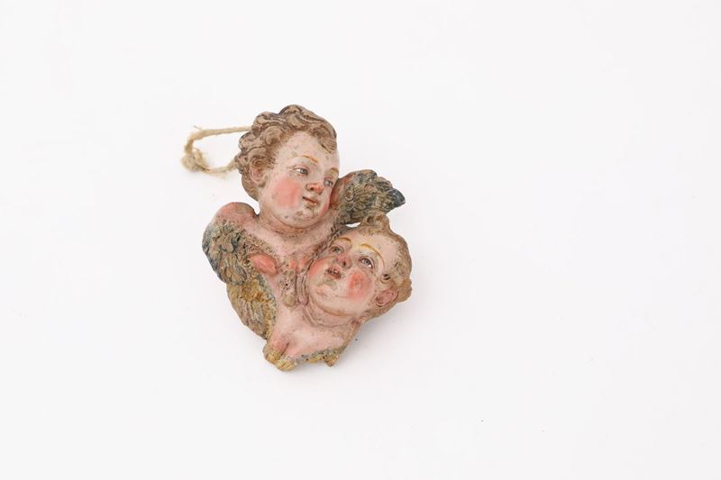 Coppia di Cherubini Legati in Terracotta Policroma