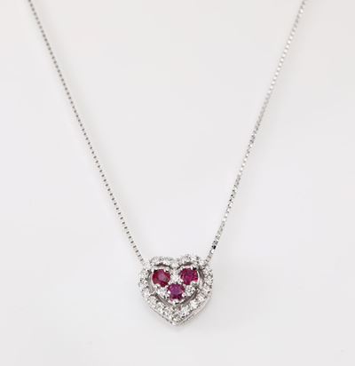 Pendente a Cuore in Oro Brillanti e Rubini.