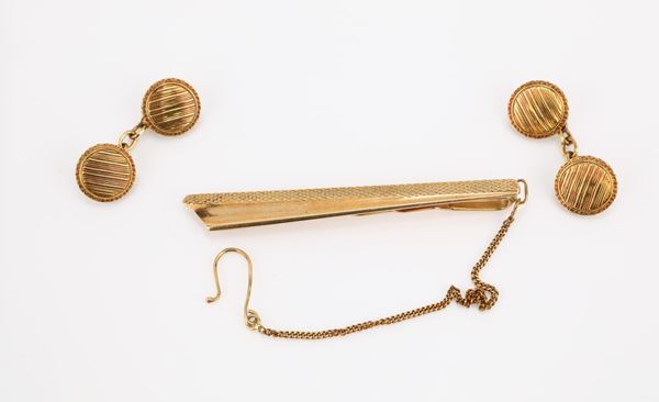 Parure di fermacravatta e gemelli in oro