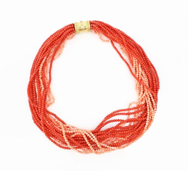 Torchon in corallo rosso e rossa e oro