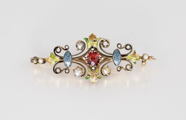 Spilla liberty in oro, smalti policromi, granato e perla