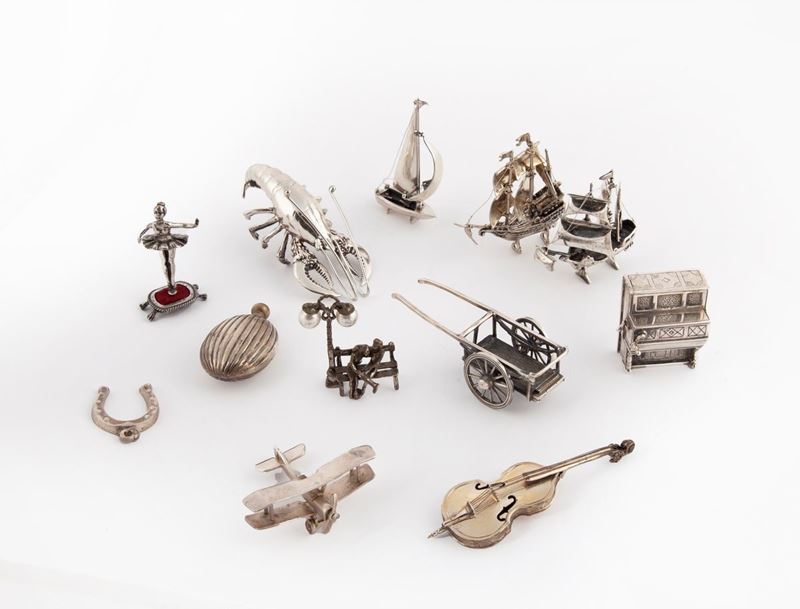 Lotto Composto da Dodici Miniature in Argento a Diverso Titolo