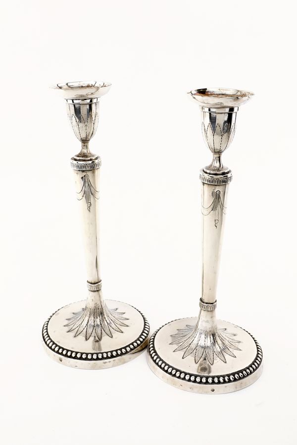 Coppia di candelieri in argento, Roma, dopo il 1815, argentiere Francesco Colein (1795 - 1842)