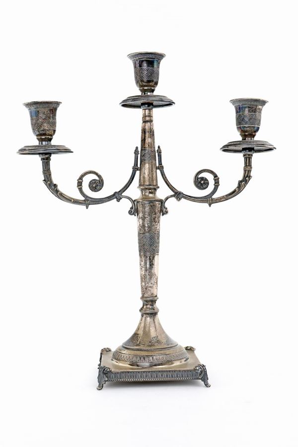 Candelabro in argento a tre luci