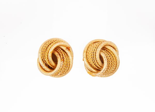 Coppia di orecchini a nodo in metallo dorato