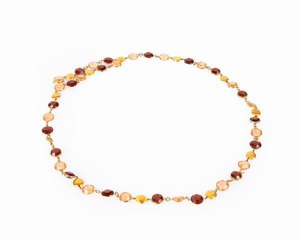 Collana in metallo dorato con pietre in bachelite marroni e rosa cipria