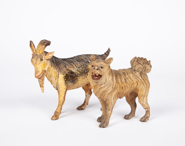 Due figure di animale in legno policromo
