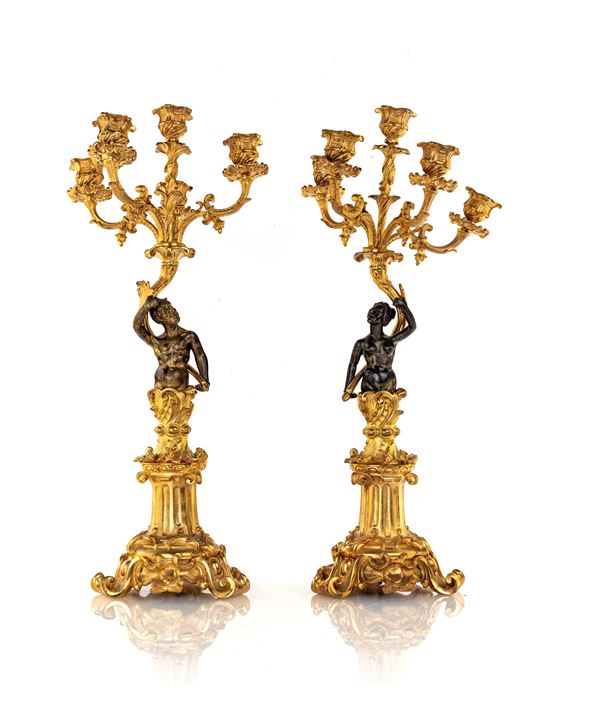 Coppia di candelabri in bronzo dorato a cinque luci, XIX secolo