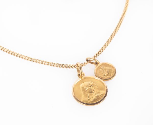 Collana in oro con 2 pendenti votivi