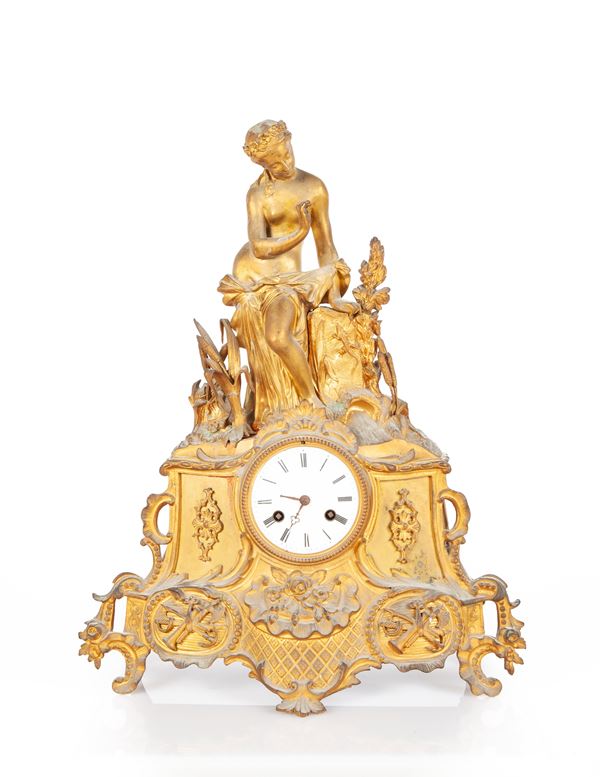 Orologio da camino in metallo dorato, XIX secolo