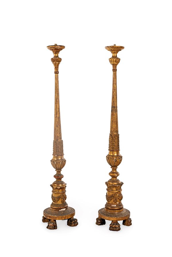 Coppia di torciere in legno dorato, XIX secolo
