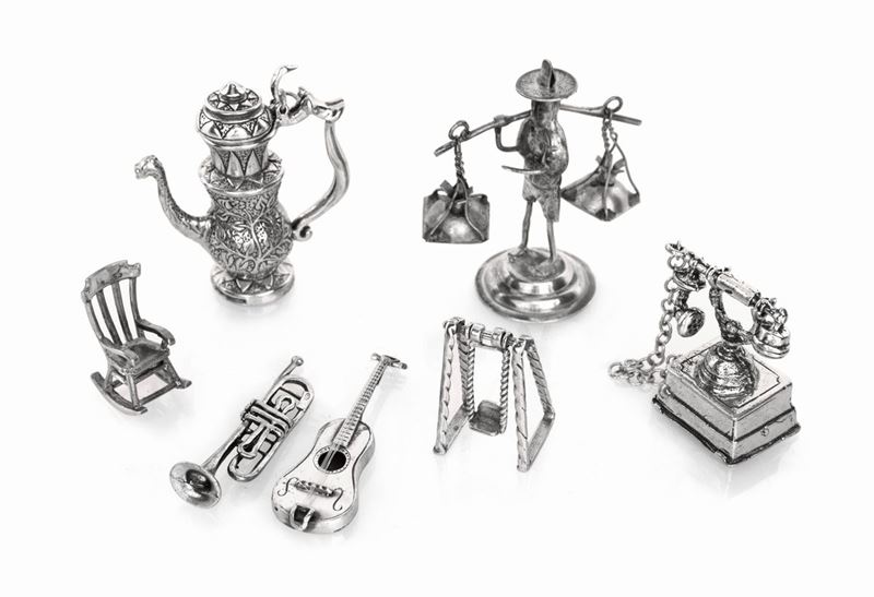 Sette Miniature in Argento