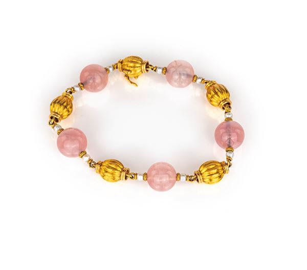 Bracciale in oro perle e quarzo rosa  - Asta Gioielli - Casa d'Aste Arcadia