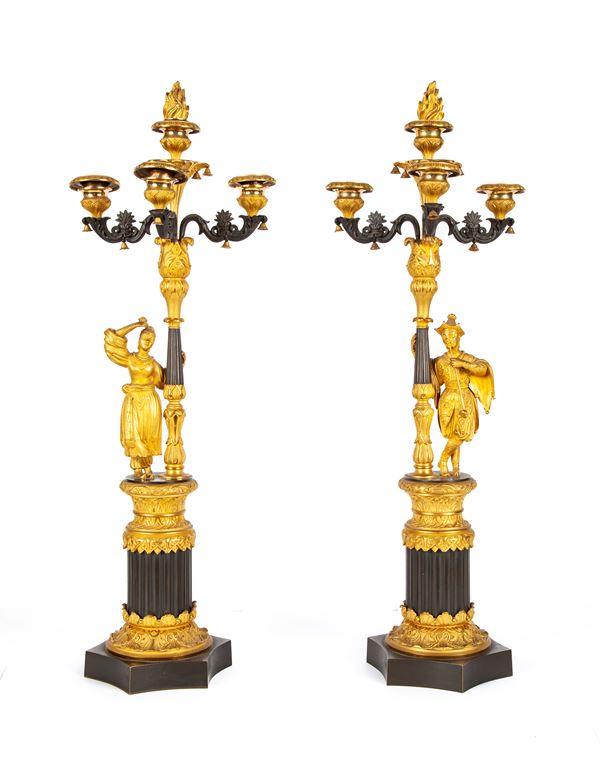 Coppia di candelabri in bronzo dorato e brunito d'epoca Impero a quattro luci