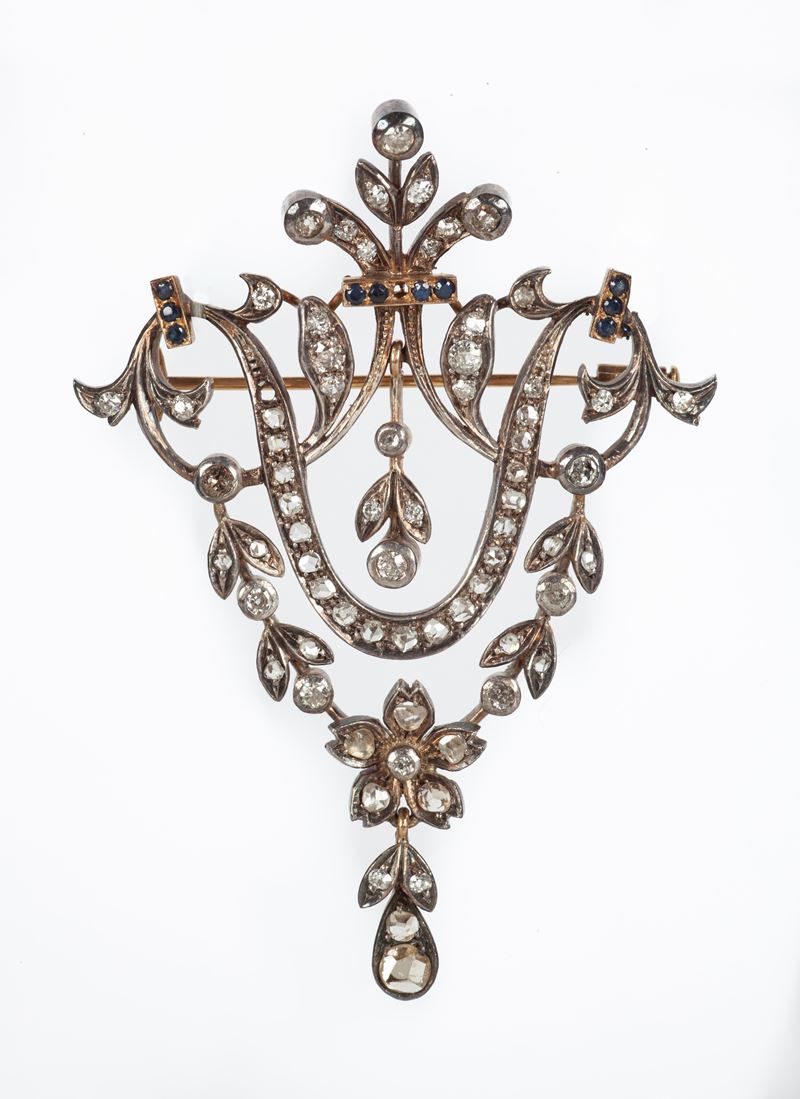 Spilla antica in oro e argento