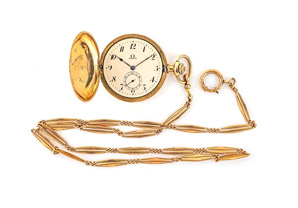 Omega, orologio da tasca in oro savonette con catena in oro