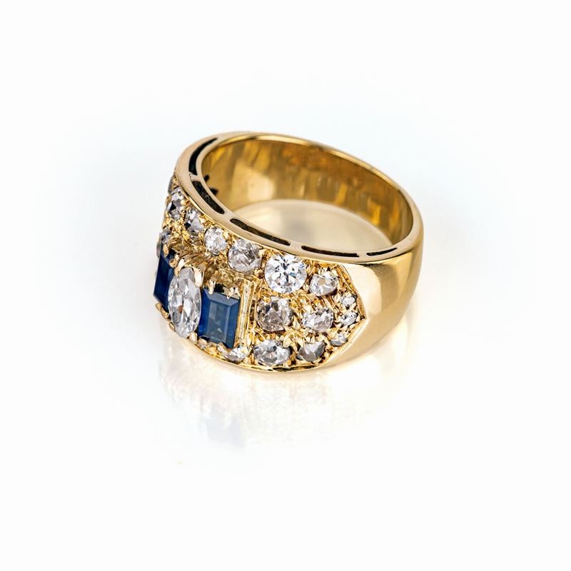 Anello a Fascia in Oro Brillanti e Zaffiri