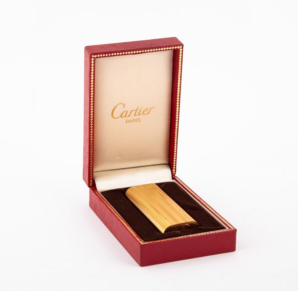 Cartier - Accendino placcato in oro giallo satinato a spina di pesce