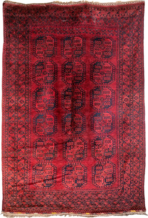 Grande tappeto afgano bicolore fondo rosso rubino  - Asta Asta a Tempo - Tappeti Antichi e Rari - Casa d'Aste Arcadia