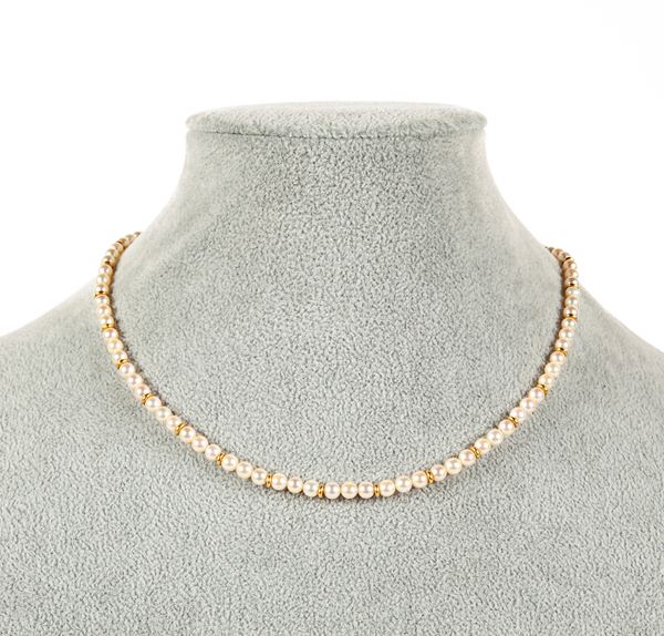 Collana in microperle e oro